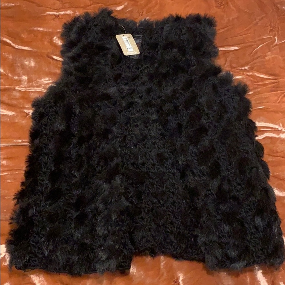 Black faux fur vest